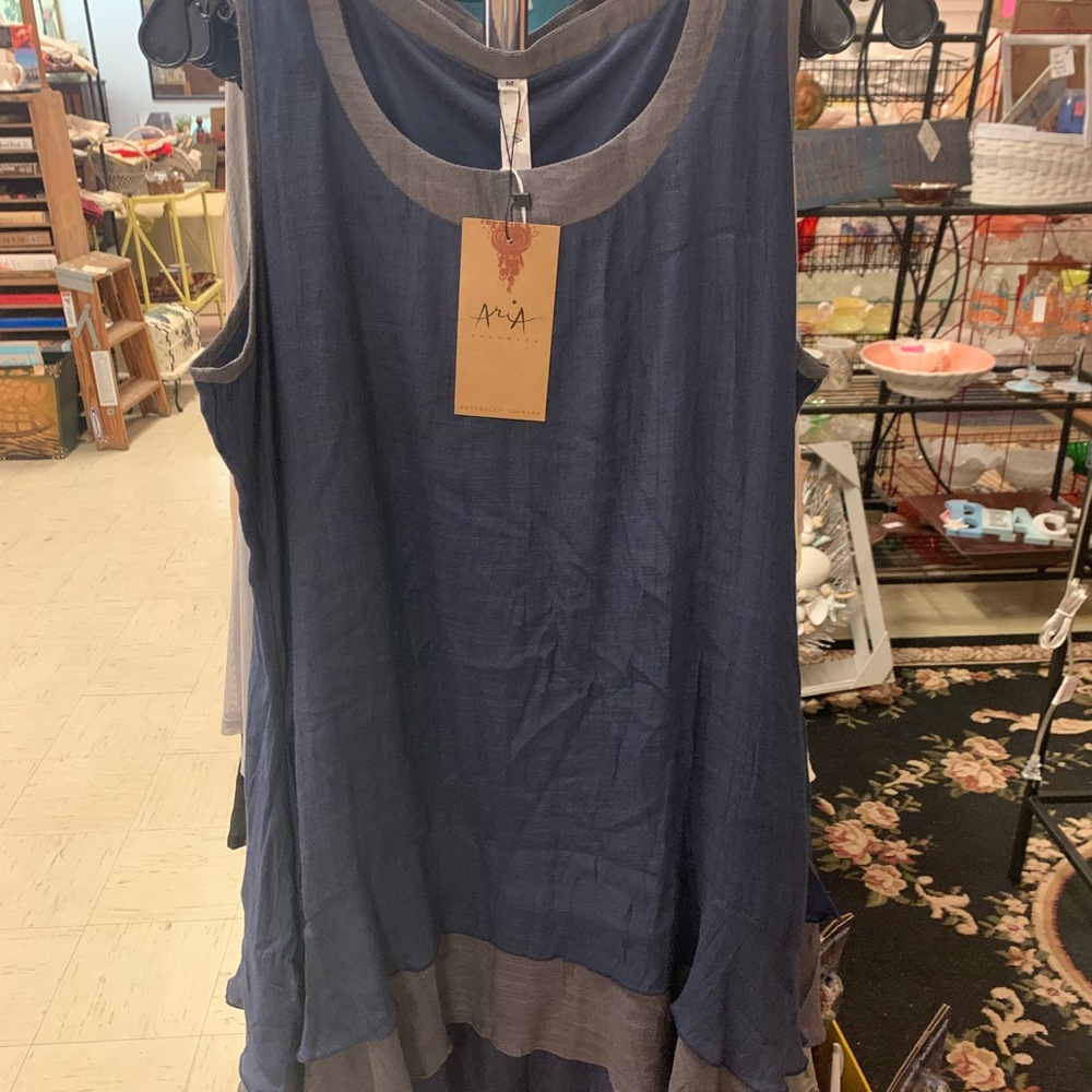 Blue/gray sleeveless dress with pockets.